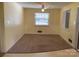 Living room with neutral walls, carpet and large windows provides a bright, inviting space at 3009 Grier St, Newton, NC 28658