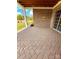 Spacious brick patio with a covered area and outdoor access, ideal for entertaining or relaxation at 3011 Ella Katherine Way, Charlotte, NC 28210