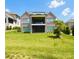 Spacious backyard with lush green lawn and brick home at 3011 Ella Katherine Way, Charlotte, NC 28210