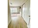 Light filled bedroom featuring hardwood floors, window seat, built-in storage and large closet at 3011 Ella Katherine Way, Charlotte, NC 28210