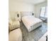 Comfortable bedroom with large bed, side tables, and seating at 3011 Ella Katherine Way, Charlotte, NC 28210