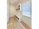 Organized mudroom featuring built-in bench seating and storage compartments at 3011 Ella Katherine Way, Charlotte, NC 28210