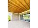 Covered patio area with brick walls and sliding glass doors at 3011 Ella Katherine Way, Charlotte, NC 28210