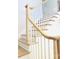 Close up on a wooden staircase with white railings and detailed finish work at 3011 Ella Katherine Way, Charlotte, NC 28210