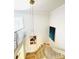 Stairway with contemporary hanging light fixture and modern artwork on the wall at 3011 Ella Katherine Way, Charlotte, NC 28210