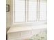 Cozy window seat with custom Roman shades and built-in storage at 3011 Ella Katherine Way, Charlotte, NC 28210