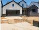Charming new construction featuring a two-car garage and modern design at 328 Linda Carol Ln, Tega Cay, SC 29708