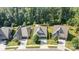 Beautiful aerial view of a well-maintained house with lush green trees and manicured lawns at 3899 Zemosa Nw Ln, Concord, NC 28027