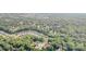 A high angle view shows the home's location surrounded by nature at 3899 Zemosa Ln NW Concord, NC at 3899 Zemosa Nw Ln, Concord, NC 28027