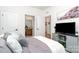 Comfortable bedroom with TV, soft pillows, and attached bathroom at 3899 Zemosa Nw Ln, Concord, NC 28027