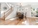 Dining area featuring hardwood floors and natural light at 3899 Zemosa Nw Ln, Concord, NC 28027