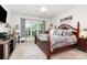 Bedroom with natural light, ceiling fan, stylish bed and neutral carpet at 3899 Zemosa Nw Ln, Concord, NC 28027