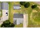 Overhead view of a home showcasing a backyard with multiple structures and surrounding greenery at 400 N Main Gq St, Granite Quarry, NC 28146