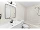 Clean bathroom featuring a white vanity, a white toilet, and a shower/tub combo at 400 N Main Gq St, Granite Quarry, NC 28146
