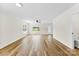 Modern open living area with large windows providing lots of natural light and modern flooring throughout at 400 N Main Gq St, Granite Quarry, NC 28146