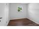 Bright bedroom featuring hardwood floors and a window letting in natural light at 405 Jones Street St, Monroe, NC 28110