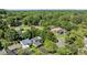 A stunning aerial view of the home and neighborhood surrounded by mature trees at 4208 Burning Tree Dr, Charlotte, NC 28277