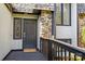 Front door with stone siding at 4208 Burning Tree Dr, Charlotte, NC 28277