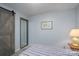 Bedroom features a sliding barn door with a framed picture at 47209 Paradise Ln, Norwood, NC 28128