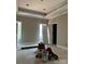 Spacious bedroom with tray ceiling, complemented by two windows and natural light at 4940 Southview Dr, Hickory, NC 28602
