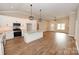 Open concept kitchen with modern appliances, granite countertops, and views to the living area at 4940 Southview Dr, Hickory, NC 28602
