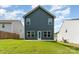 This beautiful home features a well-maintained lawn and modern exterior at 5010 Arbordale Way, Mount Holly, NC 28120