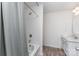 Clean bathroom with a shower-tub combo and single vanity with a clean white counter at 5010 Arbordale Way, Mount Holly, NC 28120