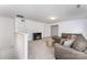 Inviting living room showcasing a cozy fireplace, comfortable seating, and neutral tones at 5010 Arbordale Way, Mount Holly, NC 28120