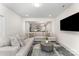 Comfortable living area with a sectional sofa and an open floor plan at 5010 Arbordale Way, Mount Holly, NC 28120