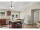 Well-appointed kitchen with an island, granite counters, and stainless steel appliances at 5206 Crane Point Dr, Charlotte, NC 28227