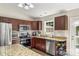 Updated kitchen boasting granite countertops, stainless steel appliances, and ample cabinet space at 5206 Crane Point Dr, Charlotte, NC 28227