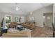 Inviting living room with hardwood floors and comfortable seating arrangement at 5206 Crane Point Dr, Charlotte, NC 28227