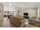 Open-concept living room featuring vaulted ceilings and hardwood floors at 5206 Crane Point Dr, Charlotte, NC 28227
