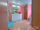 Bathroom with white vanity, large mirror and good lighting at 589 Owls Den Rd, Lincolnton, NC 28092