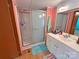 Bathroom features modern vanity with drawers and frameless shower doors at 589 Owls Den Rd, Lincolnton, NC 28092