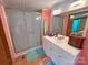 Inviting bathroom boasts modern fixtures, spacious shower, and updated vanity at 589 Owls Den Rd, Lincolnton, NC 28092