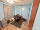 Office features wood-look floors, adequate space and a closet for storage at 589 Owls Den Rd, Lincolnton, NC 28092