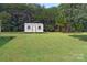 Durable storage shed on a spacious lawn, perfect for outdoor equipment and storage solutions at 589 Owls Den Rd, Lincolnton, NC 28092