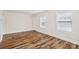 Well-lit bedroom with hardwood floors and fresh paint at 603 Paradise St, Monroe, NC 28112