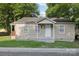 Quaint single-story house with a covered entry and well-maintained lawn at 603 Paradise St, Monroe, NC 28112