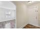Hallway view with arched doorway, painted walls and hardwood floors at 603 Paradise St, Monroe, NC 28112