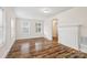 Inviting living room featuring beautiful hardwood floors and a classic fireplace at 603 Paradise St, Monroe, NC 28112