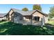 Beautiful backyard with fenced-in patio area and lush green lawn, perfect for outdoor enjoyment at 860 Wynnshire Dr, Hickory, NC 28601