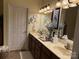 Bright bathroom featuring double sink vanity, neutral color scheme, and elegant fixtures at 860 Wynnshire Dr, Hickory, NC 28601