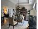 Elegant dining room with a round table, chandelier, and display cabinet at 860 Wynnshire Dr, Hickory, NC 28601
