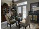 Bright dining area featuring a glass table and white patio doors at 860 Wynnshire Dr, Hickory, NC 28601