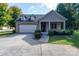 Charming single-story home with a well-manicured lawn and inviting front entrance at 860 Wynnshire Dr, Hickory, NC 28601