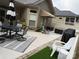 Outdoor patio setup with dining area, ample seating, and elegant decor at 860 Wynnshire Dr, Hickory, NC 28601