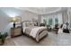 Comfortable bedroom featuring a chandelier, neutral walls, and plush bedding at 8637 Annabel Lee Ln, Charlotte, NC 28277