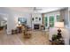 Cozy living room features a fireplace, large windows, and comfortable seating arrangement at 8637 Annabel Lee Ln, Charlotte, NC 28277